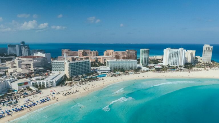 A stunning aerial view of Cancun's beachfront hotels and turquoise waters.